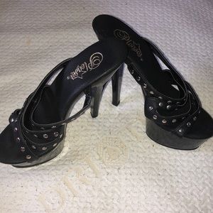 Black leather Pleaser sharply high heels size 7